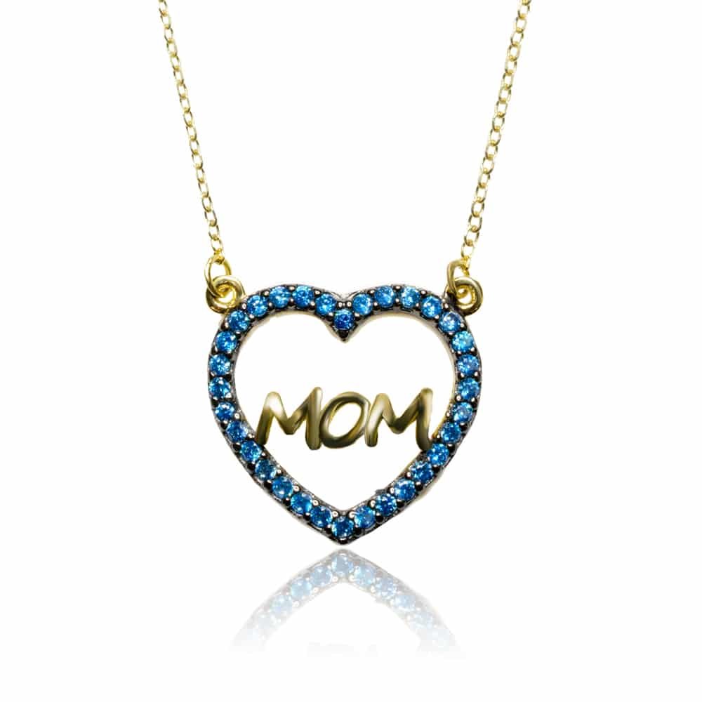 Κολιέ καρδιά ΜΟΜ, από χρυσό 14Κ. H καρδιά είναι διακοσμημένη με γαλάζια ζιργκόν, ενώ η λέξη "ΜΟΜ" έχει λουστρέ φινίρισμα.