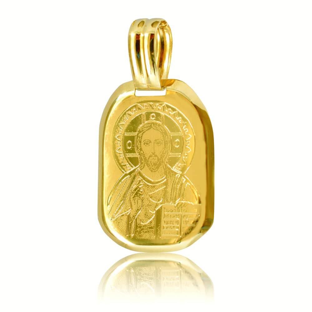 Φυλαχτό χρυσό με τον Χριστό 14Κ. Έχει ορθογώνιο σχήμα και χαραγμένη απεικόνιση του Χριστού σε λουστρέ και ματ φινίρισμα. Συνδυάστε το με αλυσίδα ή παραμάνα.