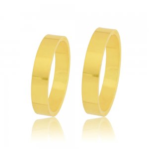 Χρυσές βέρες γάμου 14Κ, σε κλασικό πλακέ σχέδιο, με τετραγωνισμένη επιφάνεια 4 mm και λουστρέ λαμπερό φινίρισμα. Η αρχική τιμή αναφέρεται σε μία βέρα Νο 10 και μεταβάλλεται ανάλογα με το νούμερό σας.