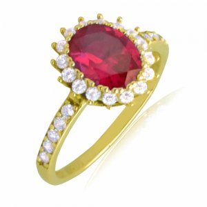Δαχτυλίδι ροζέτα από χρυσό 14Κ, σε οβάλ σχήμα. Είναι διακοσμημένο με ένα οβάλ κόκκινο ζιργκόν στο κέντρο και λευκά περιμετρικά.