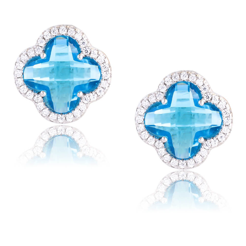 Ασημένια σκουλαρίκια με μπλε πέτρες 230277 Ασημένια σκουλαρίκια με μπλε πέτρες, επιπλατινωμένα. Έχουν σχήμα σταυρού και τα κοσμούν υπέροχες γαλάζιες και λευκές πέτρες ζιργκόν. Ιδανικά για πολύ εντυπωσιακές εμφανίσεις!